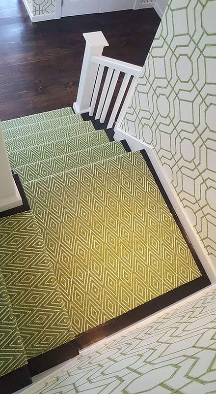 Green and white diamond stair runner after installation