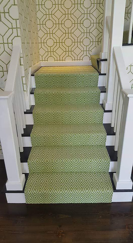 Green and white diamond stair runner after installation