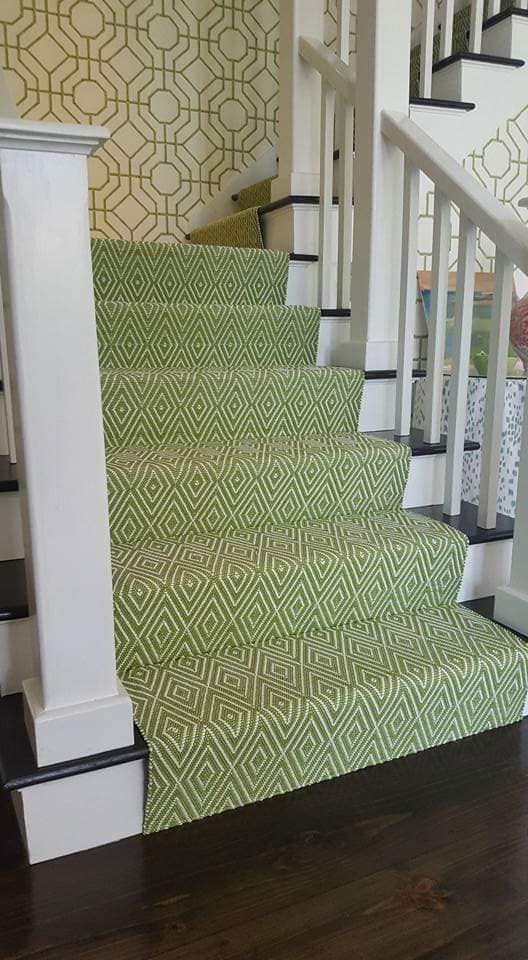 Flawless creases on green and white diamond stair runner installation