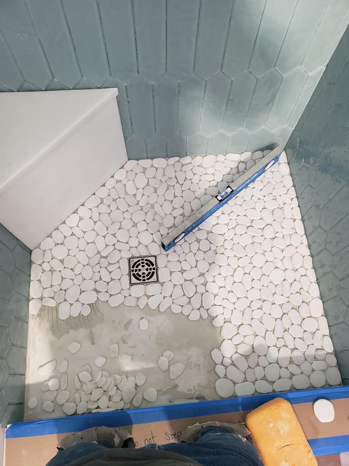 White pebbles for custom shower