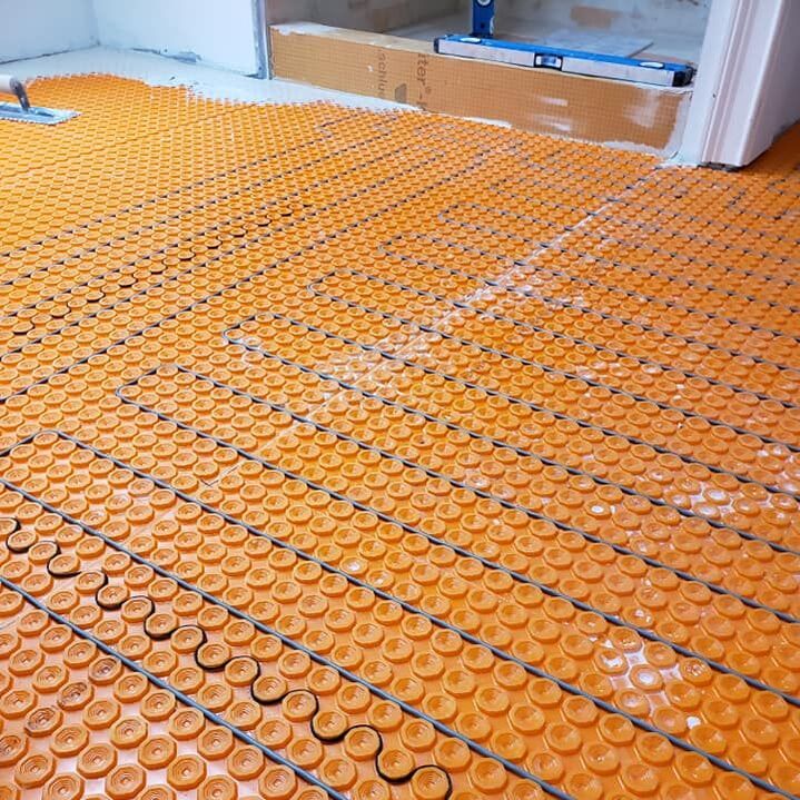 Heating mat for tile floor installation